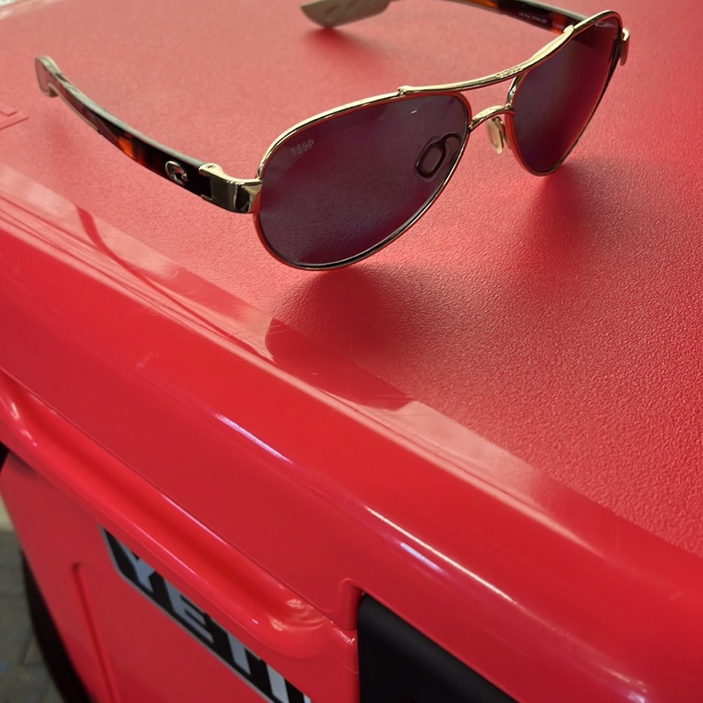 Costa loreto polarized sunglasses, gold trim. Brand new
